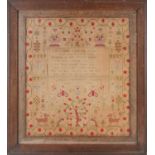 A George IV needlework sampler, completed in 1830 by Eliza Wilkinson, typically embroidered with
