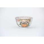 A finely enamelled and gilt tea bowl, Qianlong, circa 1750, with an elderly man, two boys and