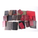 A collection of Victorian red, black Morocco leather-bound personal journals and ledgers of Henry