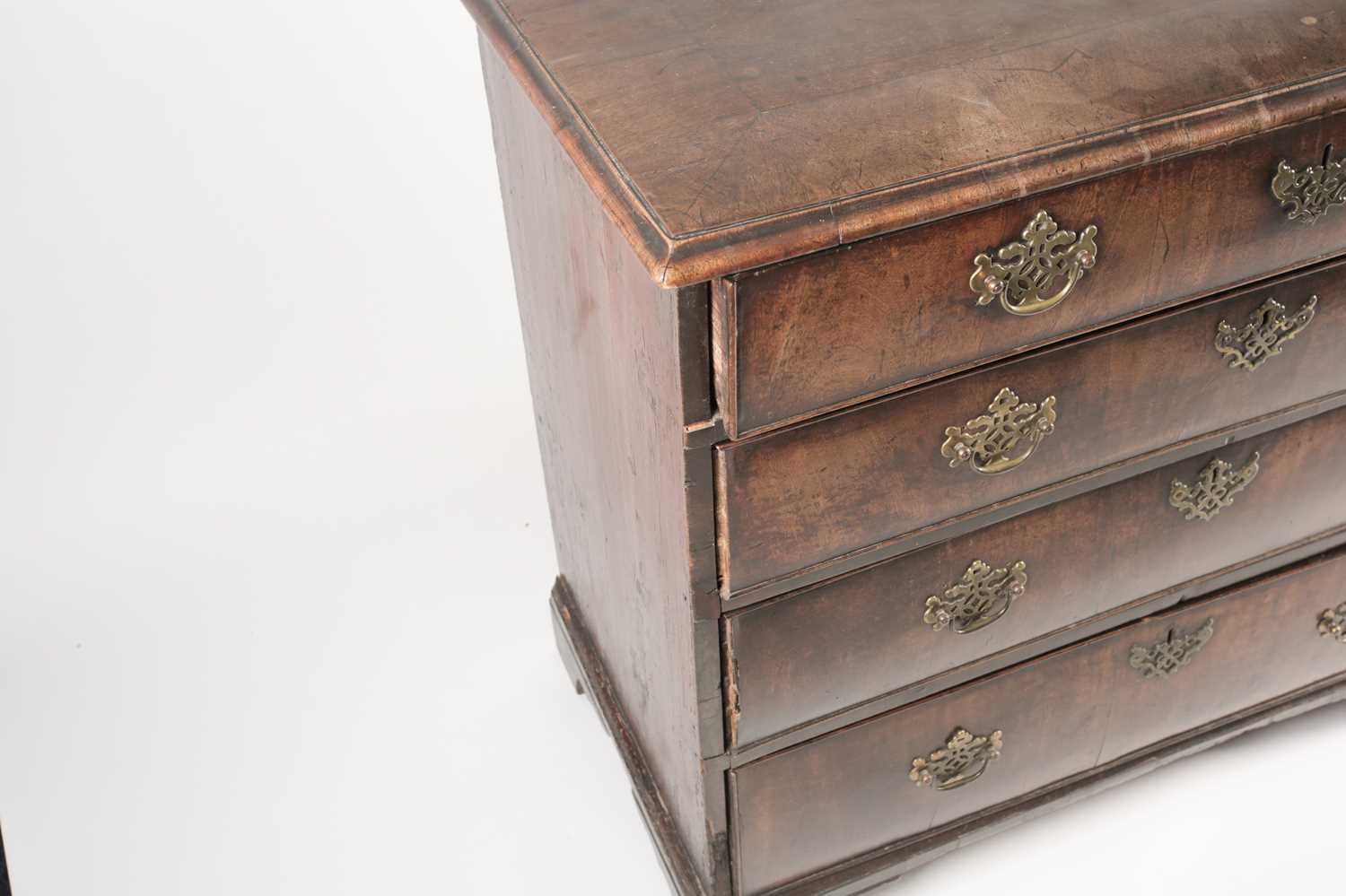 A late George II red walnut veneered chest of drawers, with broad crossbanded top above four - Image 6 of 8