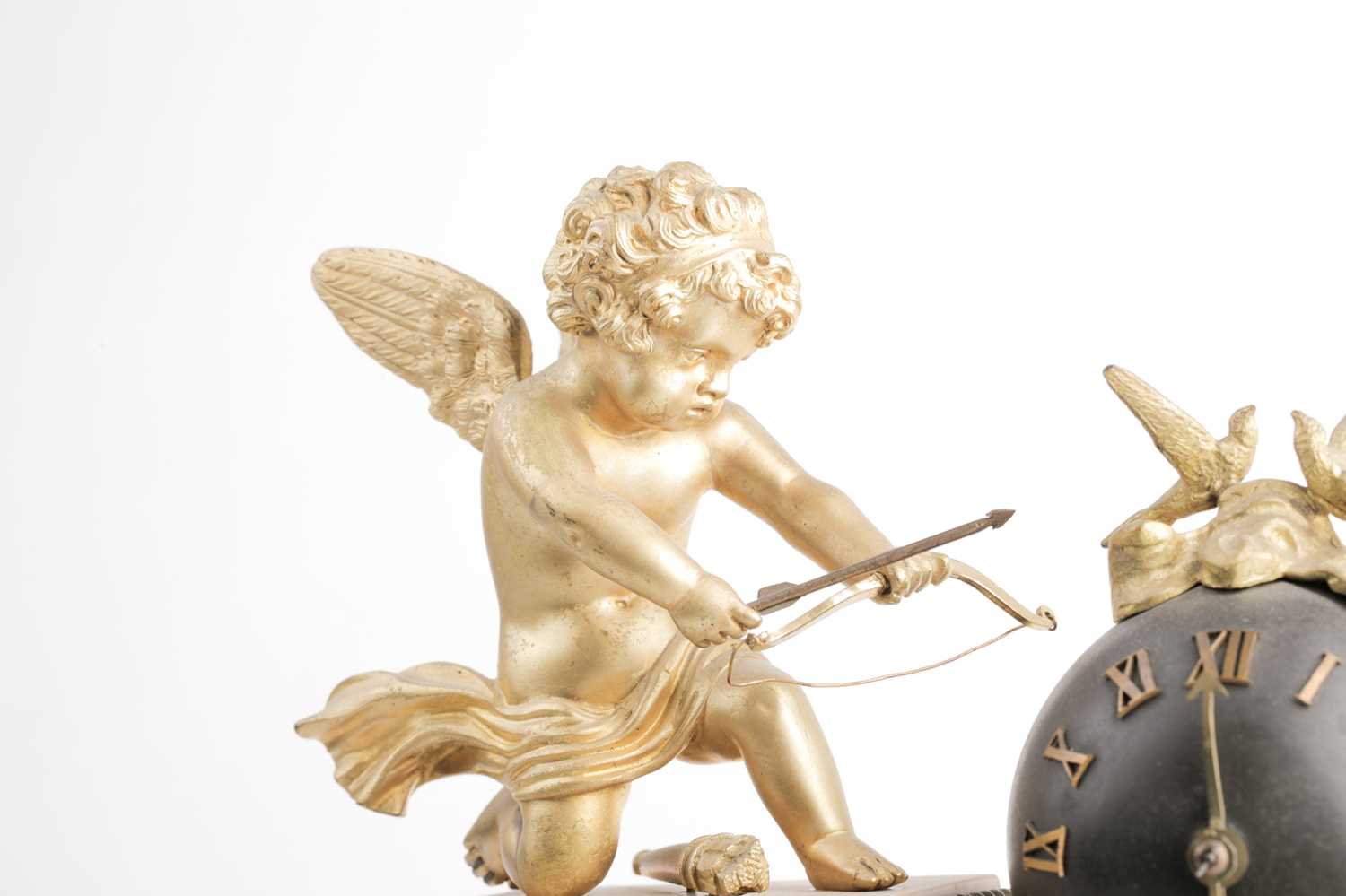 A late 19th century French marble and ormolu mounted mantle clock, mounted with a winged cupid - Image 8 of 9