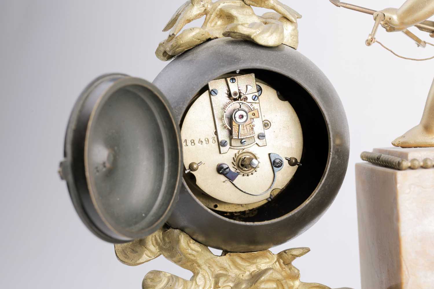 A late 19th century French marble and ormolu mounted mantle clock, mounted with a winged cupid - Image 4 of 9