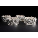 A set of four Portuguese silver plated wine coasters, by Topazio Casquinha, of circular form with