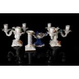 A pair of 20th century Dresden flower-adorned three-sconce candlesticks, 16.5 cm high, together with