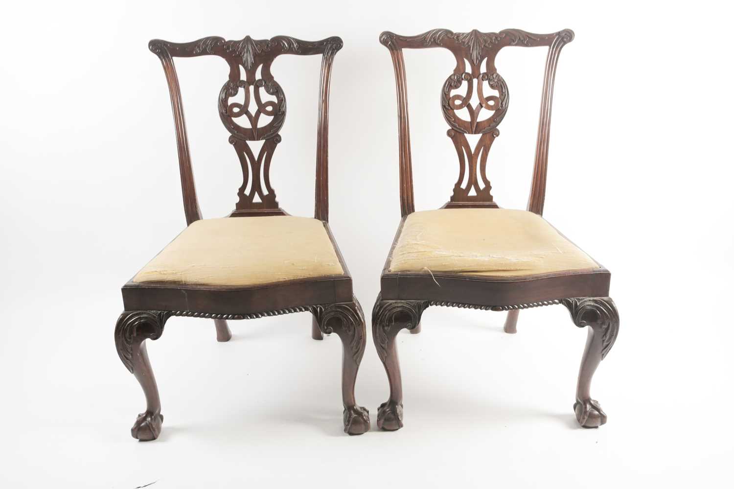 A pair of George III carved and pieced mahogany "Chippendale" style side chairs with bow-shaped - Image 2 of 24