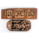 A deeply carved, and gilt Indian hardwood panel of Lord Krishna playing the flute with two smaller