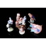 A group of eight Herend porcelain figures, variously modelled as animals and birds, the largest 8 cm