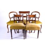 A Regency, mahogany bar back carver chair with sabre supports and scroll arms. Together with three