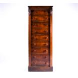 A Victorian-style reproduction, mahogany secretaire wellington chest. The interior with writing