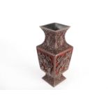 Early 20th c. Chinese cinnabar and plum coloured, square section lacquer vase. Carved with