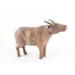 A large carved teak wood bull, probably South Asian, 34 cm high x 45 cm wide.Condition report: