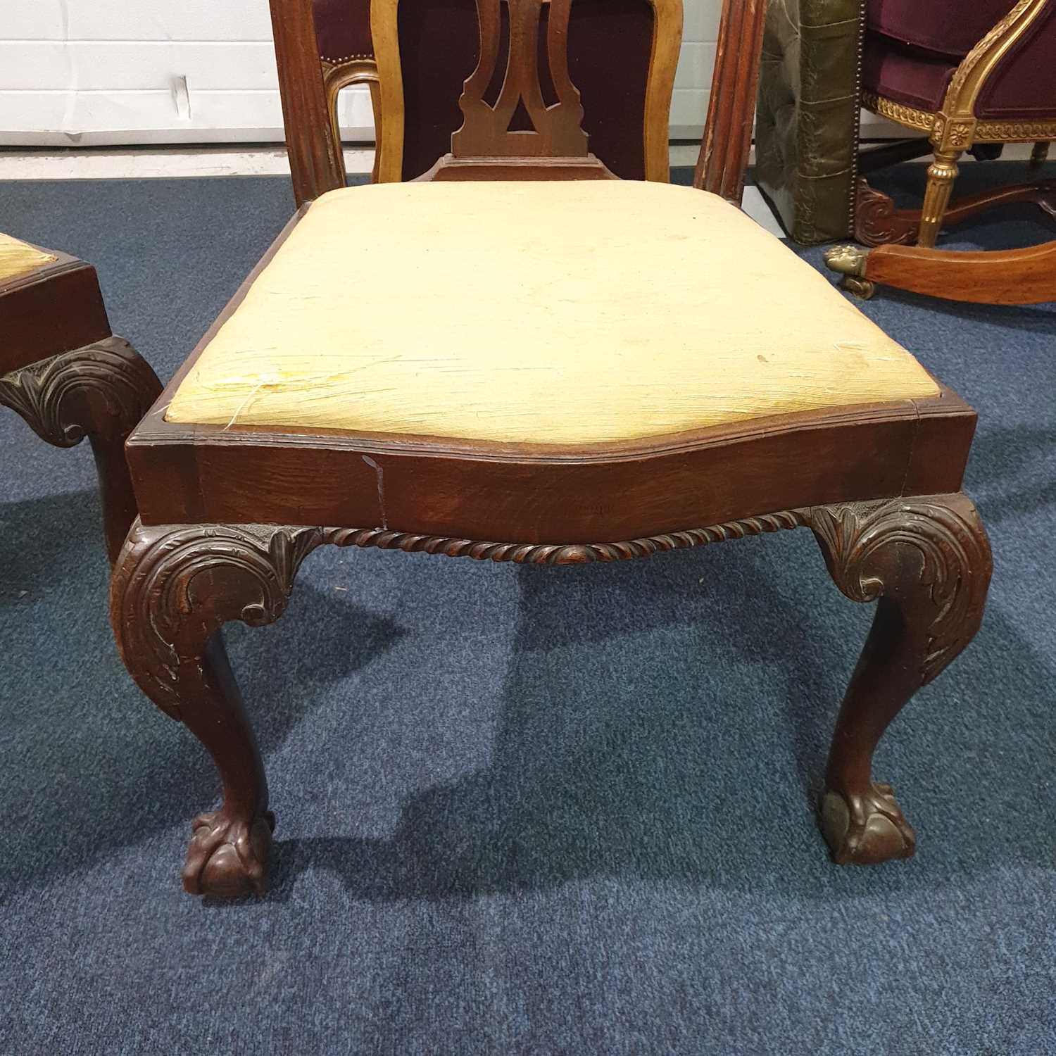 A pair of George III carved and pieced mahogany "Chippendale" style side chairs with bow-shaped - Image 11 of 24