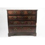 A late George II red walnut veneered chest of drawers, with broad crossbanded top above four