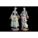 A large pair of 19th century Meissen porcelain figures of an 18th century 'Lady and Gallant', each