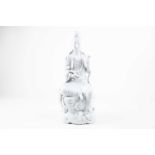 A large Chinese blanc de Chine figure of Guanyin, 20th century, modelled seated in lalitasana,