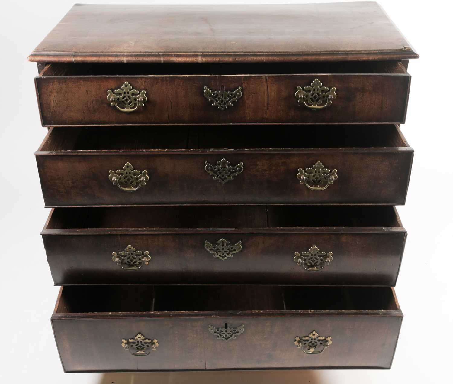 A late George II red walnut veneered chest of drawers, with broad crossbanded top above four - Image 7 of 8