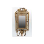 A 19th-century wall mounted girandole mirror with painted white panel surrounds and three candle