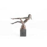 A 20th century school abstract, patinated bronze figure of a reclining nude female reaching to