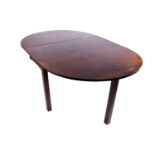 A George III mahogany oval drop leaf dining table with chamfered square supports. 122cm