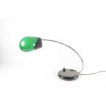 A modern Italian desk lamp, with curved chrome arm supporting a green opaline glass shade, 40 cm x
