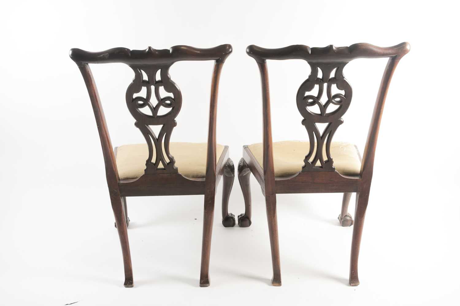 A pair of George III carved and pieced mahogany "Chippendale" style side chairs with bow-shaped - Image 4 of 24