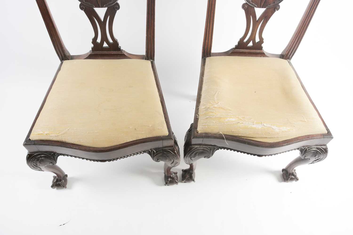 A pair of George III carved and pieced mahogany "Chippendale" style side chairs with bow-shaped - Image 3 of 24