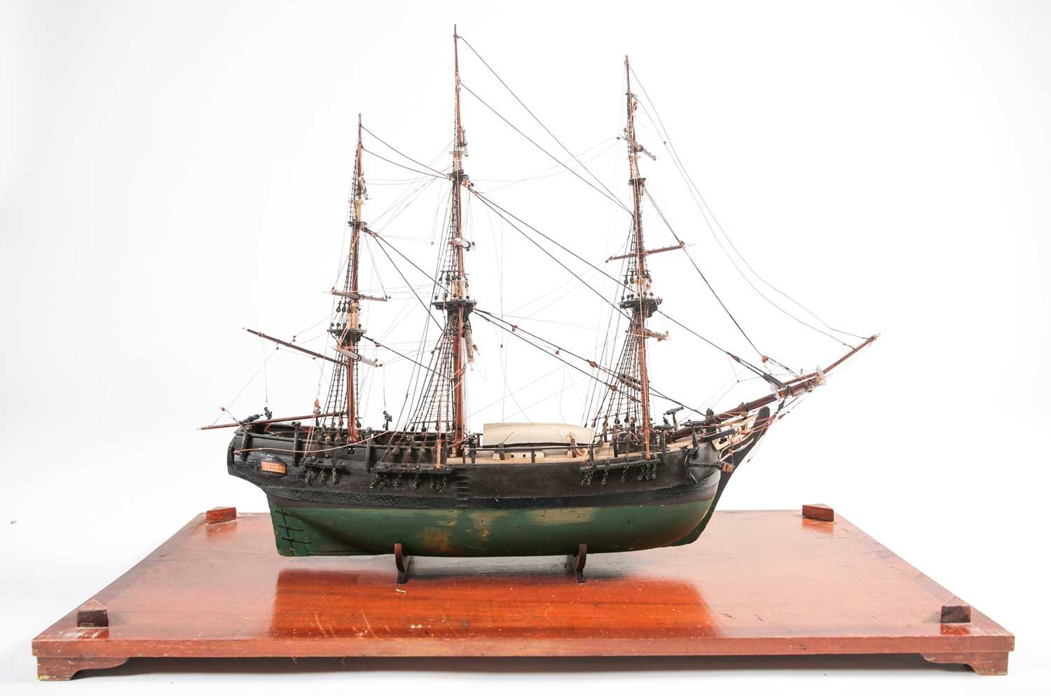 A scale model of the full-rigged HM Bounty with painted detail. Housed in a glazed display case.