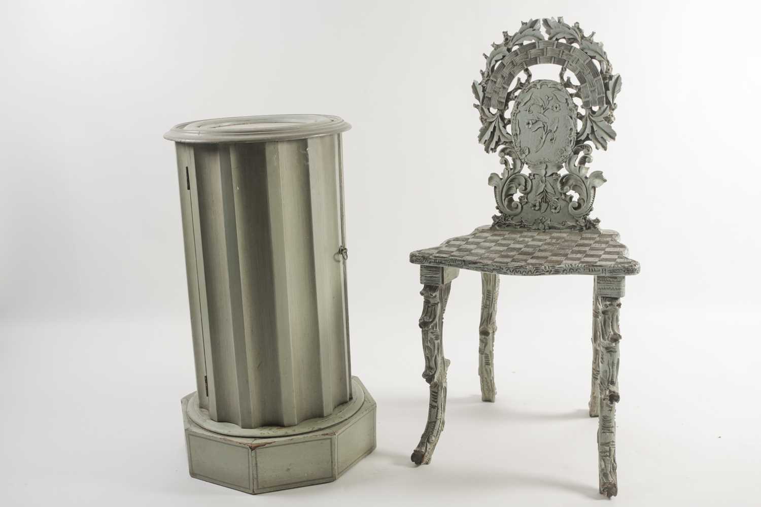 A 19th century Continental carved and painted "Rustic" hall chair and a Victorian-style circular