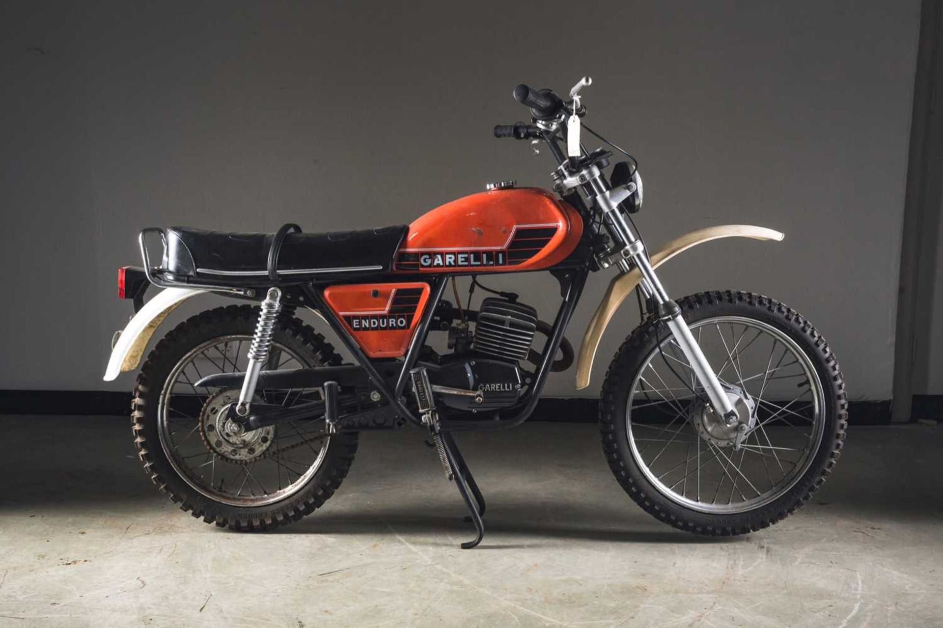 A 1981 Italian Garelli Enduro 40 red scrambler motorcycle. Odometer showing 460km. Serial number