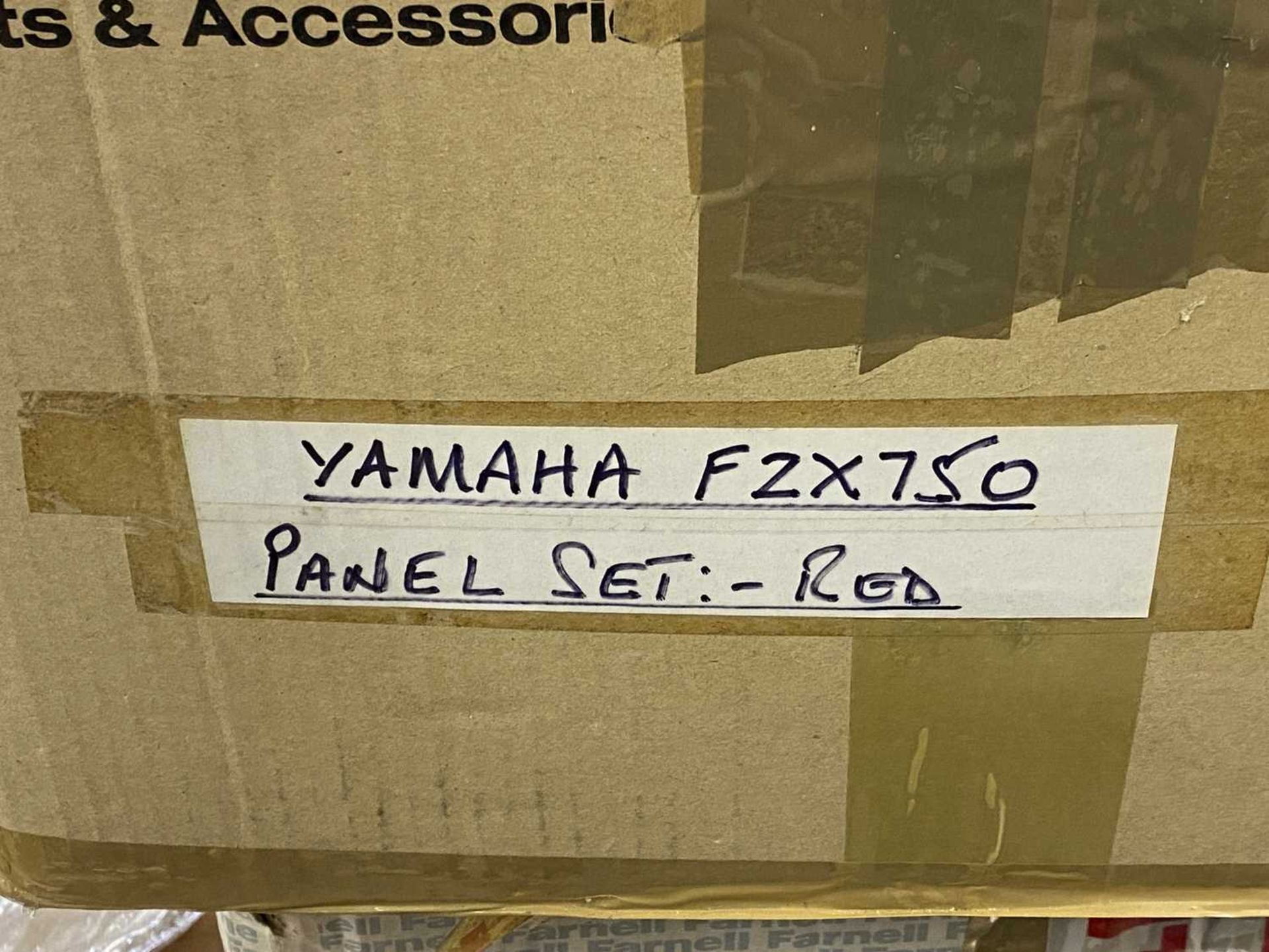 A Yamaha FZX750 red panel set, two boxes of spare parts, brake calipers, together with a folder of - Image 2 of 10