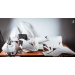 A set of BMW S1000RR fibreglass race body panels / fairings, white and unpainted.