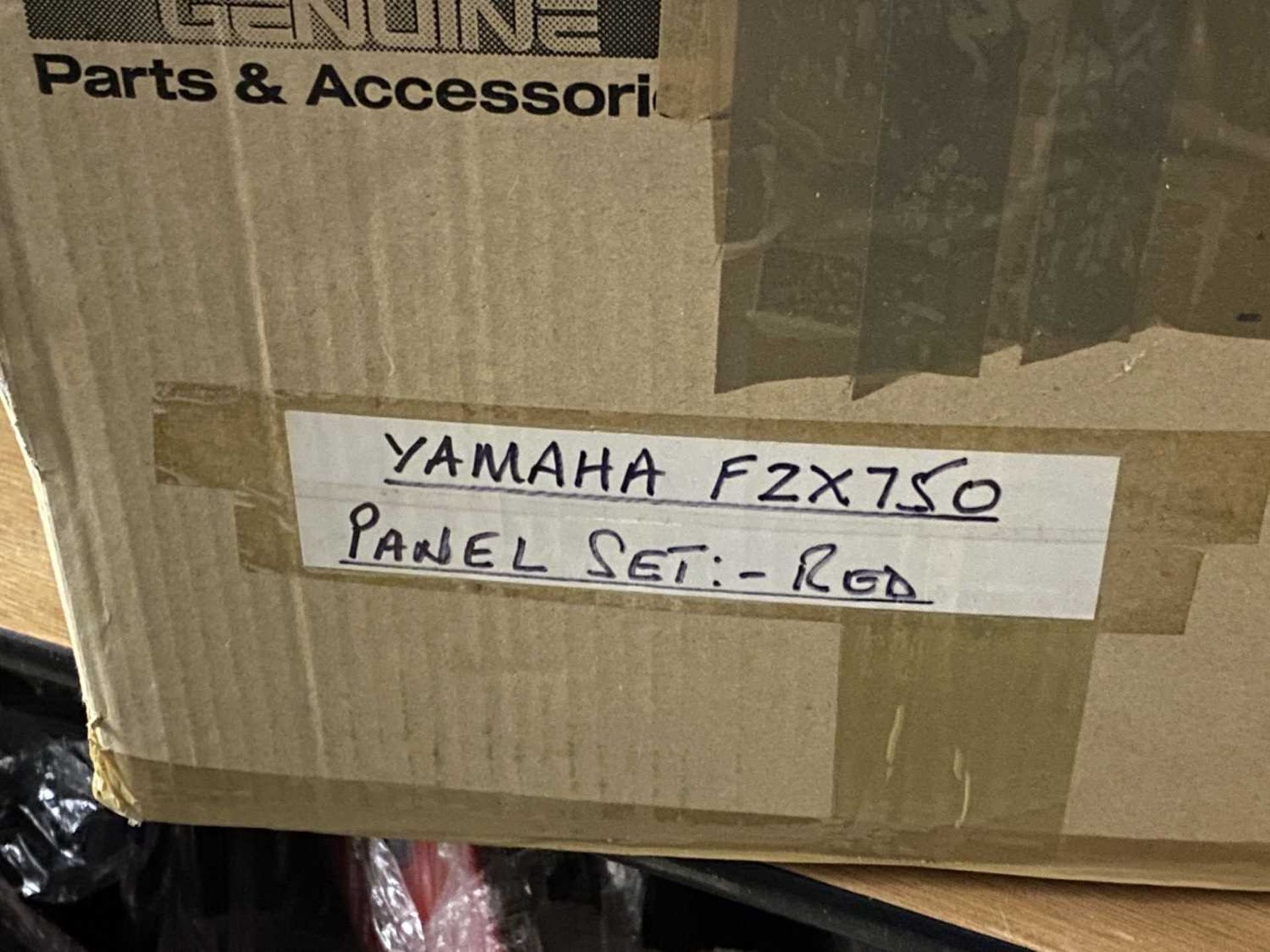 A Yamaha FZX750 red panel set, two boxes of spare parts, brake calipers, together with a folder of - Image 9 of 10