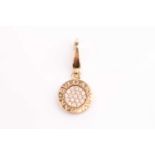 Bulgari. A gold and pave set diamond pendant, marked 'Bvlgari', the circular disc pave set with