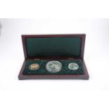 A Flora & Fauna Bahamas set, comprising a large silver ten dollar coin, a two dollar coin, and a