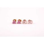 A pair of trillion cut single stone pink sapphire earrings; in simple claw mounts, together with a