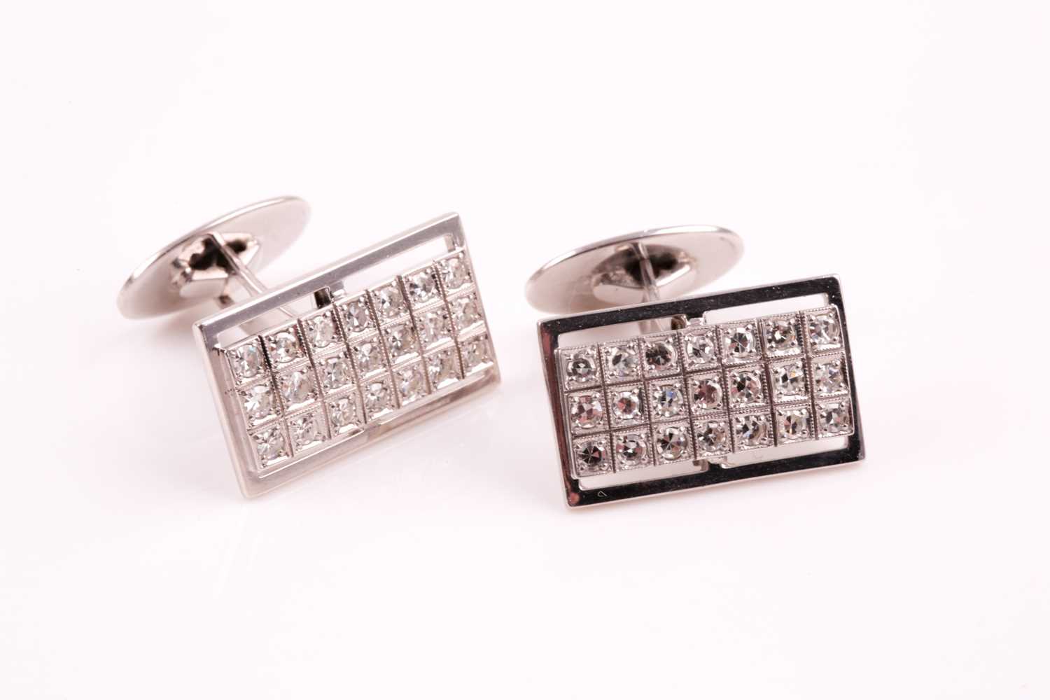 A pair of diamond cluster cufflinks, the rectangular plaques pave set with twenty one round - Image 4 of 4