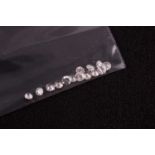 A group of fourteen various round brilliant-cut diamonds, approximate range SI2-I2 clarity,