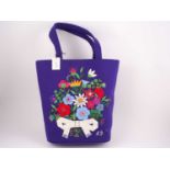 A Lulu Guiness embroidered wool felt handbag, the front decorated with a bouquet of flowers in
