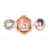 A gilt metal mounted cameo brooch, depicting Cupid and Aphrodite, 6.1 cm long (including mount),