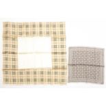 A Burberry silk scarf in classic Burberry check, together with a Louis Vuitton silk scarf