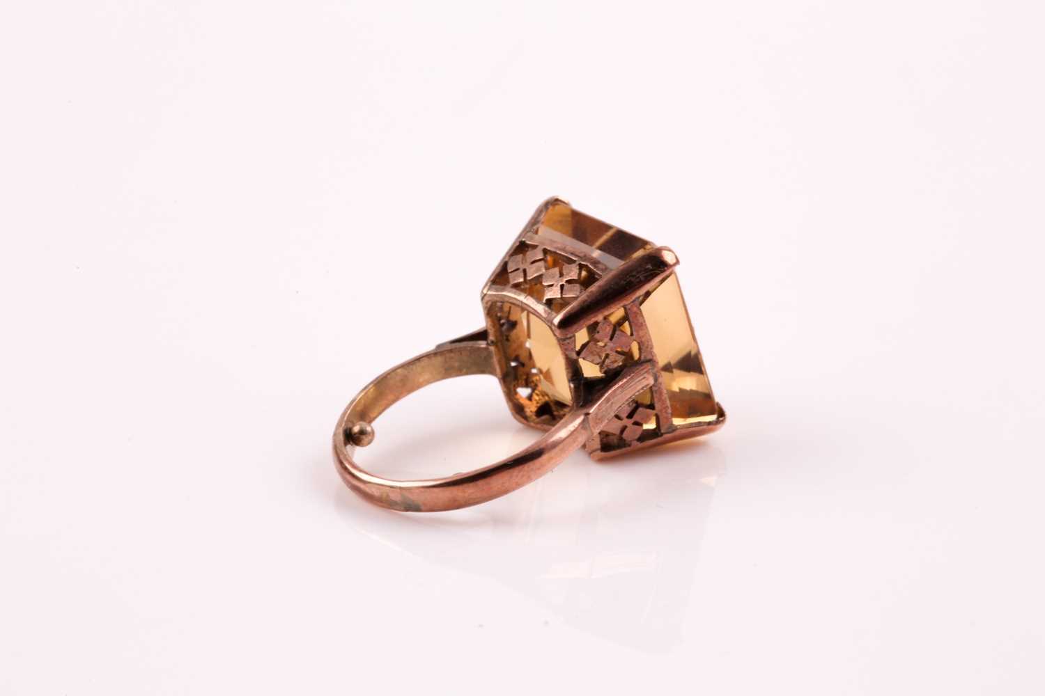 A single stone citrine ring, the square step-cut citrine, in four claw mount, foliate setting and - Image 4 of 5