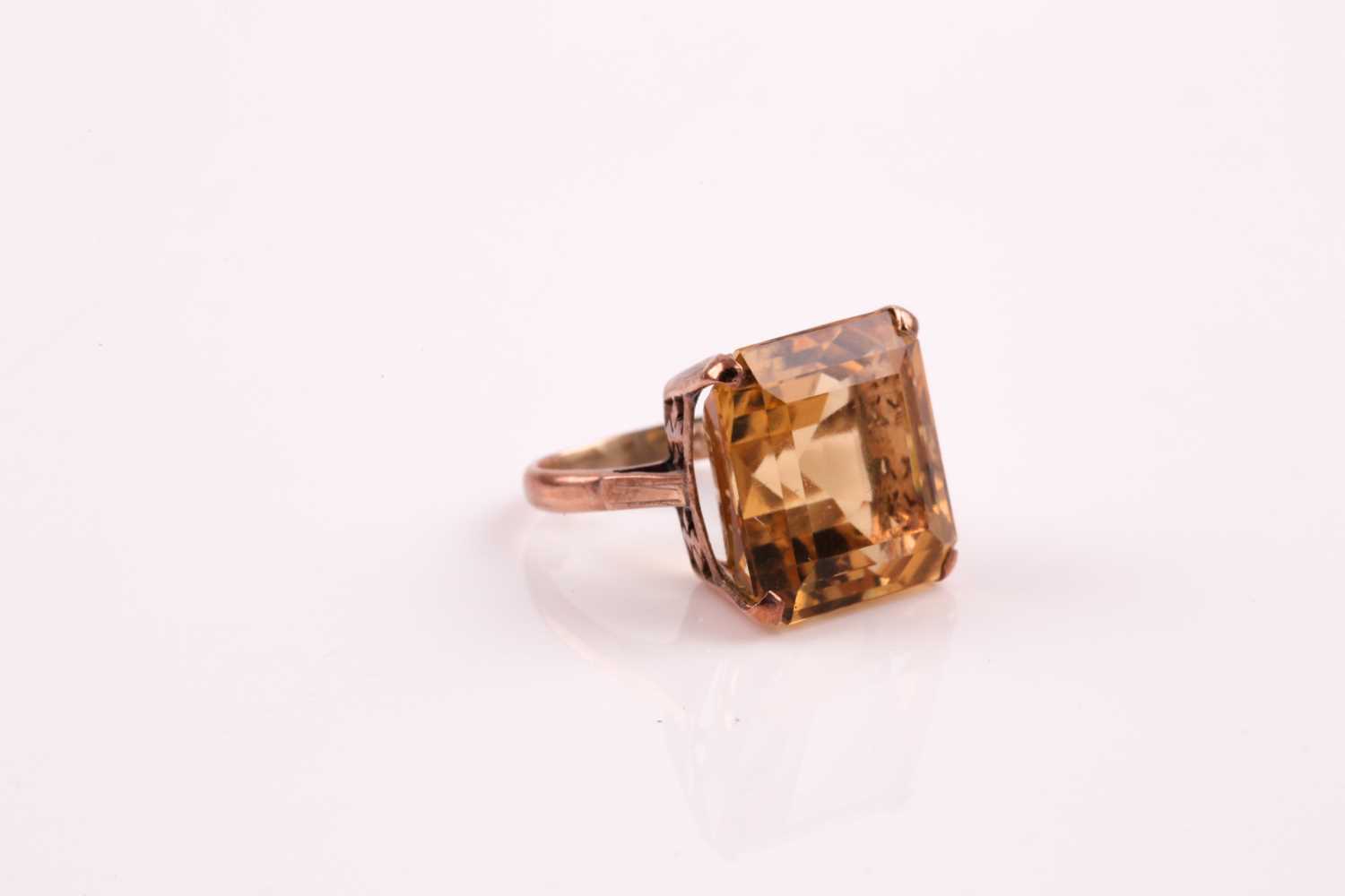 A single stone citrine ring, the square step-cut citrine, in four claw mount, foliate setting and - Image 3 of 5