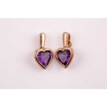 A pair of 9ct yellow gold and amethyst heart-shaped pendants, marked to suspension loops, hearts