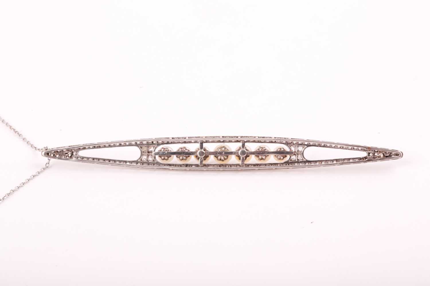 An unusual converted Edwardian diamond and pearl pendant, the elongated openwork mount centred - Image 2 of 6