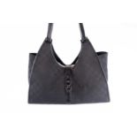 A Gucci 'Jackie' black leather and canvas handbag, a classic shoulder bag in black canvas with