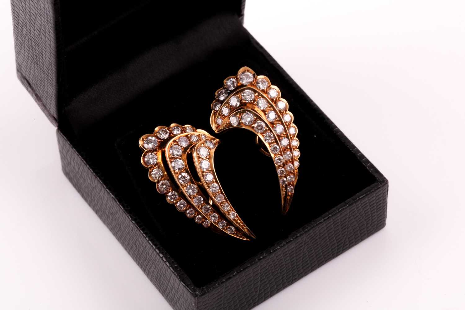 A pair of 18ct yellow gold and diamond wing earrings, each set with three rows of graduated round - Image 5 of 6