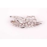 An old-cut diamond floral spray brooch, set with twenty six mixed old round-cut diamonds, the