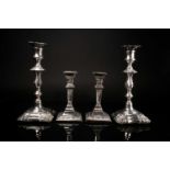 A pair of Edwardian classical revival silver dwarf candlesticks, Walter Latham & Son, Sheffield