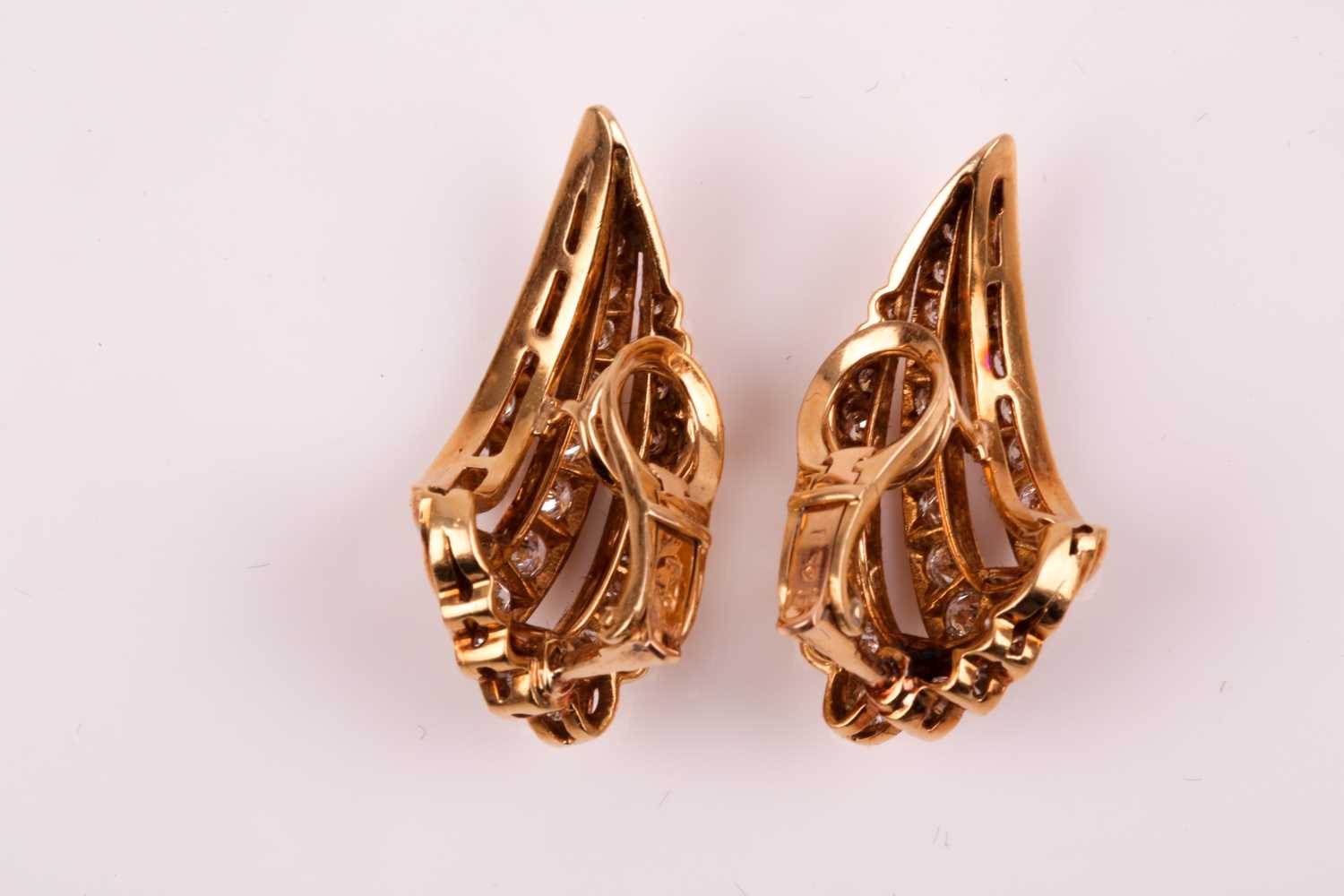 A pair of 18ct yellow gold and diamond wing earrings, each set with three rows of graduated round - Image 3 of 6