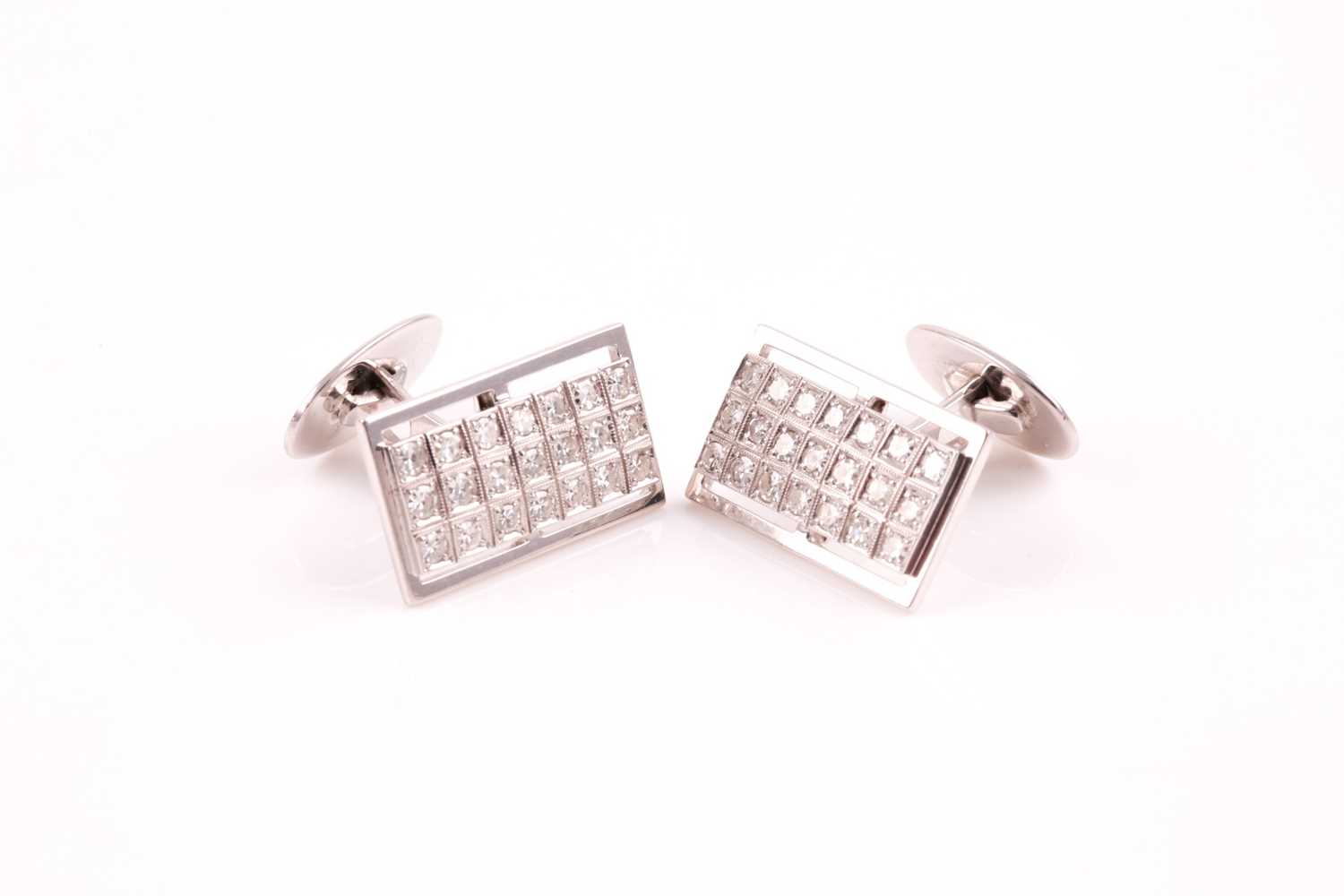 A pair of diamond cluster cufflinks, the rectangular plaques pave set with twenty one round - Image 3 of 4